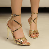 Sandales à talons hauts à bout ouvert et combinaison étroite, talon aiguille, bout rond, anneau de cheville, bandage, chaussures dorées